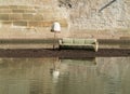 Flood desaster with furniture on an island in the water Royalty Free Stock Photo