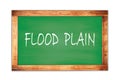 FLOOD  PLAIN text written on green school board Royalty Free Stock Photo