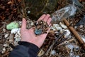 The flood washed up a lot of branches and plastic rubbish on the banks of the river. polystyrene foam from a few kilometers of roa Royalty Free Stock Photo