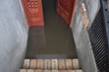 Flooded basement after the massive rain. Flooded cellar with wooden door full of dirty water