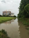 Flooded bayou and commercial construction in Houston