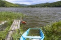 Flooded boat on the lake. Royalty Free Stock Photo