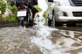 Flooded car vehicles after heavy rain,street in the alley were covered with a large amount of water,drainage problems,traffic