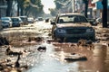 Flooded cars on on city street. Dirt and destruction after natural flood disaster