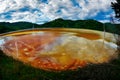 Flooded church in toxic red polluted lake due to copper mining,