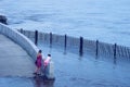 Flooded city embankment in Blagoveshchensk, Russia. Natural disaster. The rise in the level of the river due to the large amount