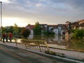 Flooded city with view of road and observers on side Royalty Free Stock Photo