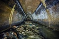 Flooded by dirty industrial wastewater sewage collector. Sewer tunnel under city full of garbage Royalty Free Stock Photo