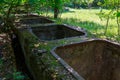 Flooded disguised secret military bunker. Abandoned bomb shelter