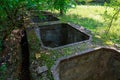 Flooded disguised secret military bunker. Abandoned bomb shelter