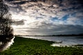 Flooded fenland and stormy sky Royalty Free Stock Photo
