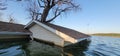 Flooded home and garage on fish lake Royalty Free Stock Photo