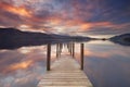 Flooded jetty in Derwent Water, Lake District, England at sunset Royalty Free Stock Photo