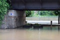 flooded lower street areas with flower pots