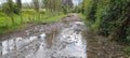 Flooded, muddy road in back country, Cotacachi, Ecuador, andes, South America Royalty Free Stock Photo