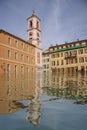 Flooded old south European city with buildings reflecting in the water. Climate change