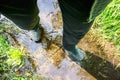 Flooded path in the summer. The concept of daily obstacles.