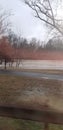 Flooded rappahannock river cresting over the embankment