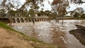 Flooded river over weir