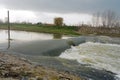 Flooded river with rural landscape Royalty Free Stock Photo