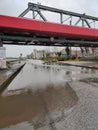 Flooded road under bridge