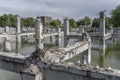 Flooded ruins of collapsed concrete building with large flock of Black-billed gulls, Christchurch, New Zealand