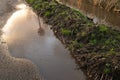 Flooded rural road due to heaving storms and climate change.