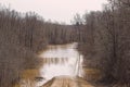 Flooded rural road Royalty Free Stock Photo