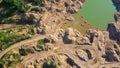 Flooded sand quarry. Place where dirt bikes ride and leave traces. Landscape for extreme quadricycles activities. Sychevo mines.