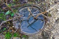 Flooded sewer with an open manhole cover. Background with copy space