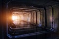 Flooded sewer tunnel is reflecting in water. Dirty urban sewage flowing throw rectangular sewer tunnel Royalty Free Stock Photo