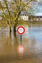 Flooded sign which reads no swimming, in France