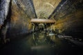 Flooded by wastewater big sewage collector. Dirty sewer tunnel under city Royalty Free Stock Photo