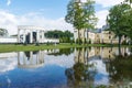 Flooding in public park in spring. Church in the flooded city park. Royalty Free Stock Photo