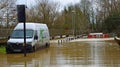 Flooding river Ouse causing bridge and road to be shut off. Van stuck in flood.