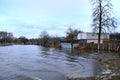 Flooding of river in spring in town during melting of snow. Natural disaster Royalty Free Stock Photo