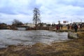 Flooding of river in spring in town during melting of snow. Natural disaster Royalty Free Stock Photo