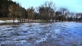 Flooding of river in spring in town during melting of snow. Natural disaster Royalty Free Stock Photo