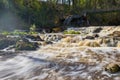 Flooding river streaming fast