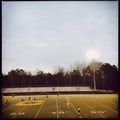 Floodlit lacrosse match Royalty Free Stock Photo