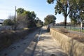 A floodway is a flood plain crossing for a road, built at or close to the natural ground level.