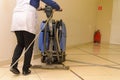 Floor care and cleaning services with washing machine Royalty Free Stock Photo