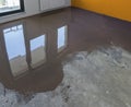Floor covering with self leveling cement mortar. Mirror smooth s Royalty Free Stock Photo