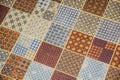 Tiled or linoleum floor covering with repeating square pattern