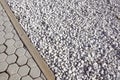 Floor design with terrace tiles and ornamental gravel Various materials for flooring in the garden Building materials