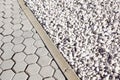 Floor design with terrace tiles and ornamental gravel Various materials for flooring in the garden Building materials