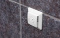 Floor heating controller on grey bathroom wall Royalty Free Stock Photo