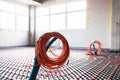 Floor heating and electrical outputs in a new building. Interior design Royalty Free Stock Photo