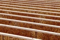 Silent style floor joists, made from engineered wood, in the floor of an office building being constructed. Royalty Free Stock Photo