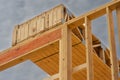 Floor joists stacked on top of first floor.